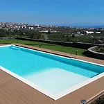 Paolimura , & * Aci Catena